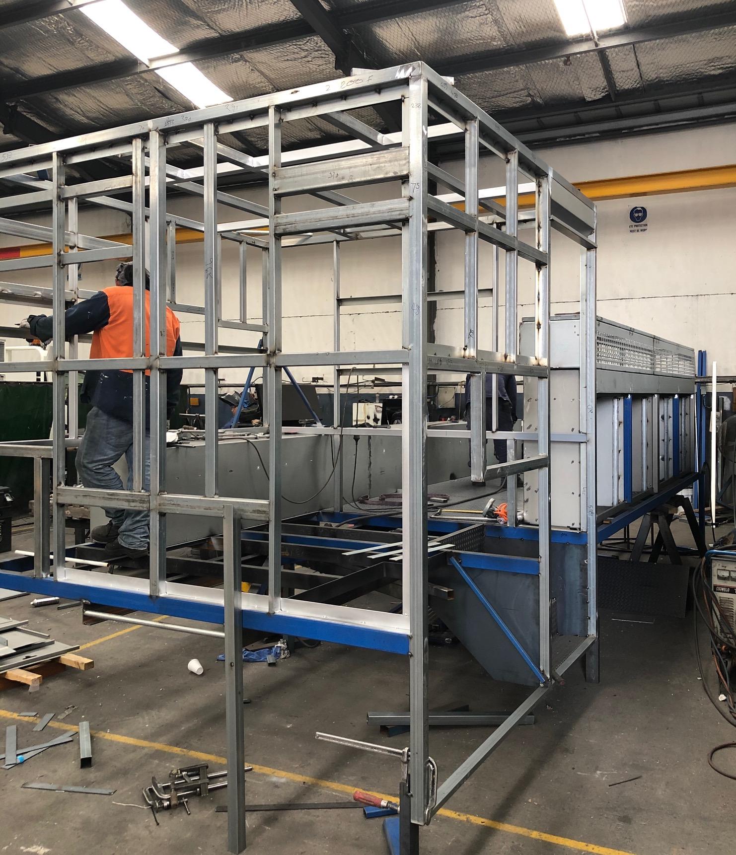 Excavator carrying vehicle, custom truck body build Osborne Motor Bodies